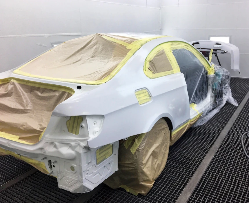 Façade extérieure d'un atelier de carrosserie-peinture **MT BOSS** à Niedermodern (67350)